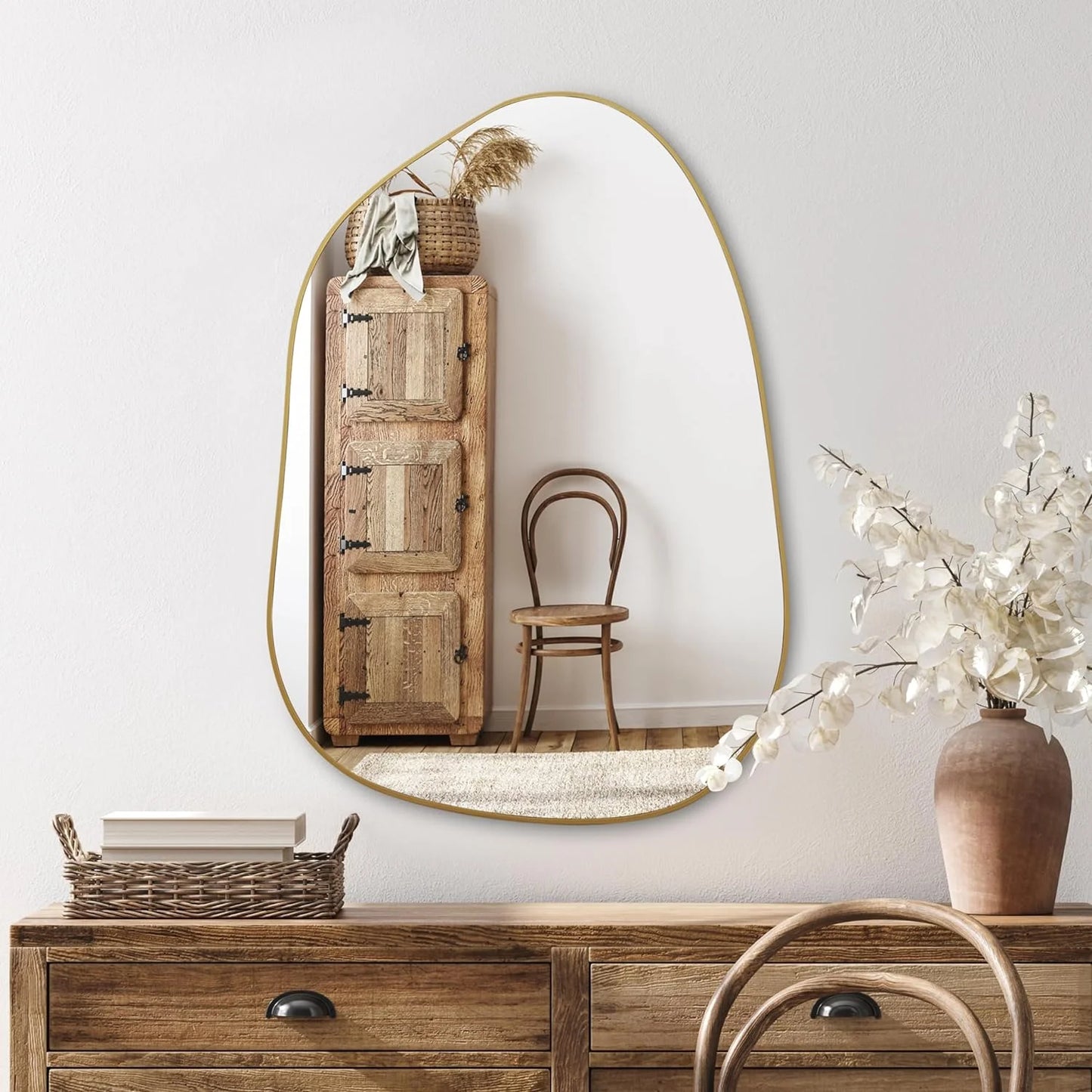 Asymmetrical Wall Mirror with Golden Wood Frame styled for a cozy modern home