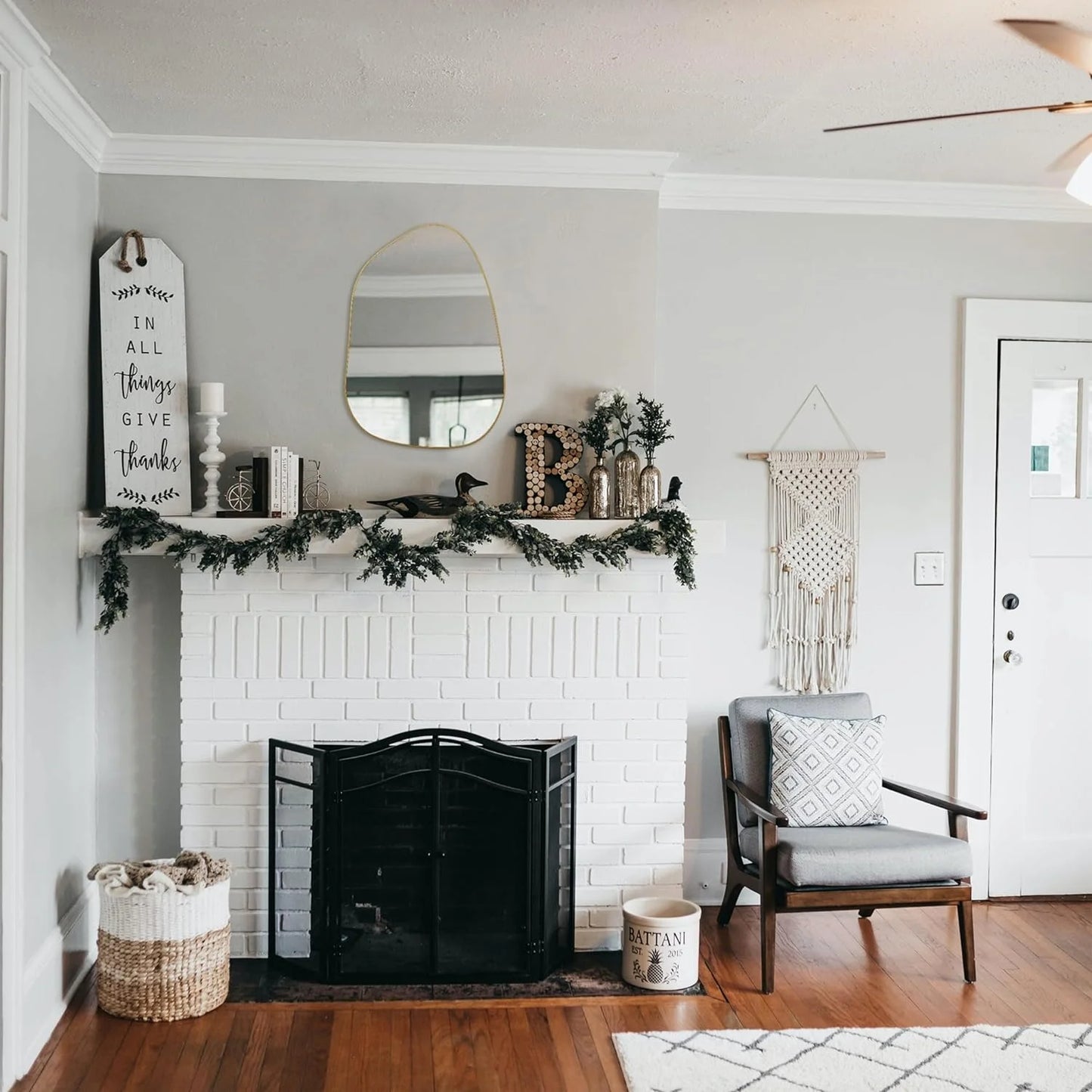 Asymmetrical Wall Mirror with Golden Wood Frame styled for a cozy modern home