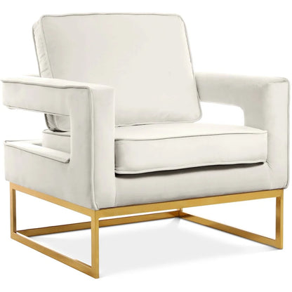 Cream Velvet Accent Chair with Gold Iron Base styled for a cozy modern home