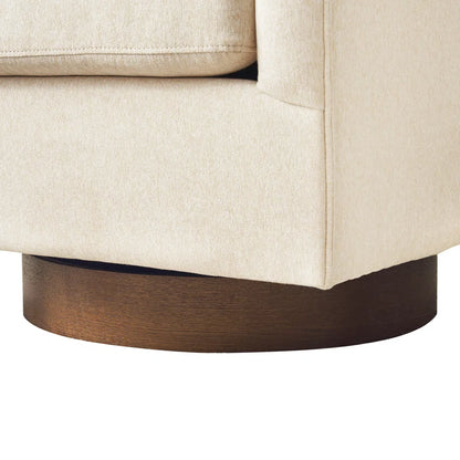 Forno Cream Upholstered Swivel Barrel Chair with Wood Base styled for a cozy modern home